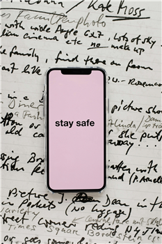 Mobile phone with stay safe written on it.