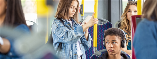 Young person on a bus